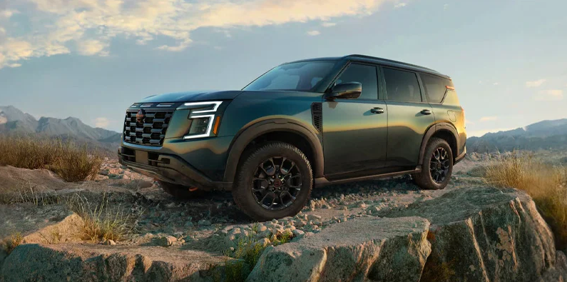 A green 2025 Nissan Armada off-roading.