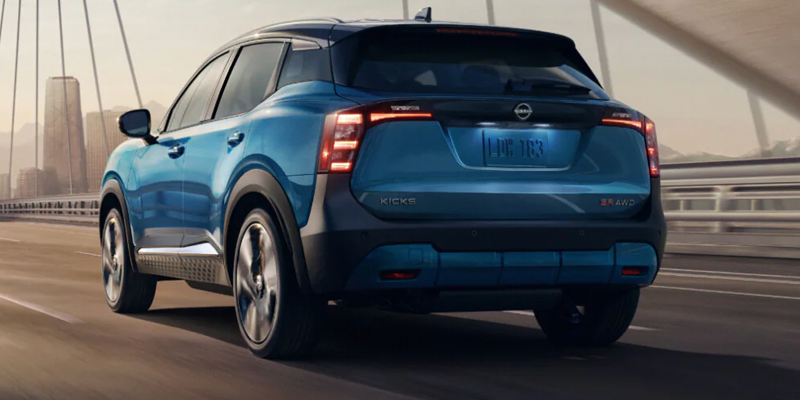 New 2026 Nissan Kicks cruising through bridge